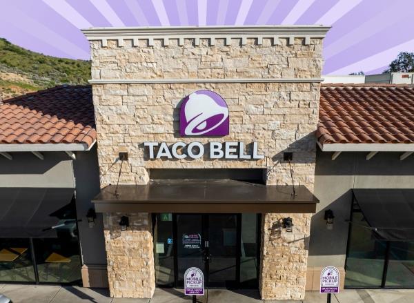 picture of Taco Bell store set on striped purple background