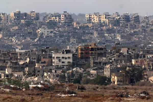 Destroyed buildings in Gaza, seen from the border with Israel. Photograph: Jack Guez/AFP via Getty 