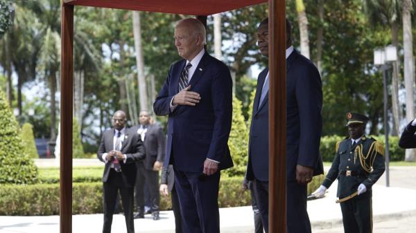 President Joe Biden stands for natio<em></em>nal anthems with Angola's President Joao Lourenco, at the presidential palace in the capital Luanda, Angola on Tuesday, Dec. 3, 2024. (AP Photo/Ben Curtis)