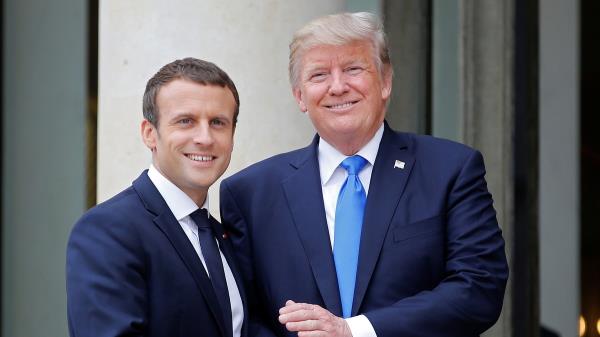 French President Emmanuel Macron greets U.S. President Do<em></em>nald Trump at the Elysee Palace in Paris, France, July 13, 2017. REUTERS/Stephane Mahe - RTX3BBC8