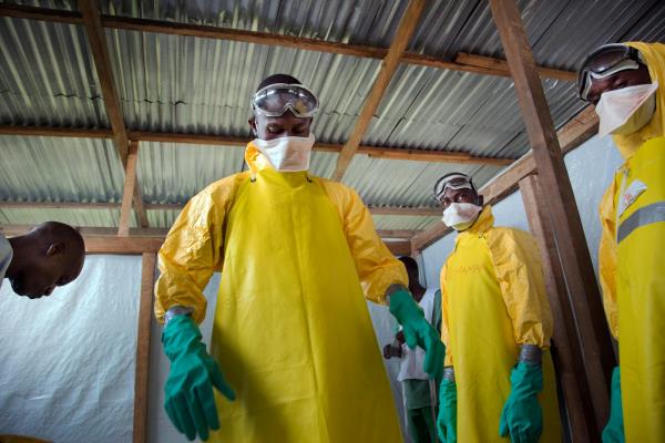 The team in charge of burning the bodies of Ebola victims.