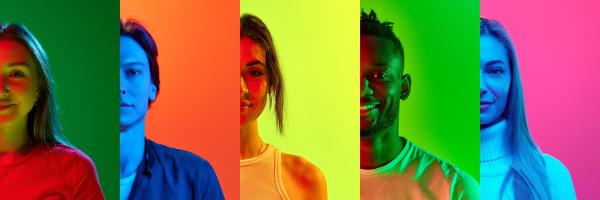 A row of people against multicoloured backgrounds