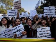 People shout slogans co<em></em>ndemning reported attacks on Hindu and other minorities in Bangladesh during a protest near the Bangladesh diplomatic mission in New Delhi (Photo: PTI)