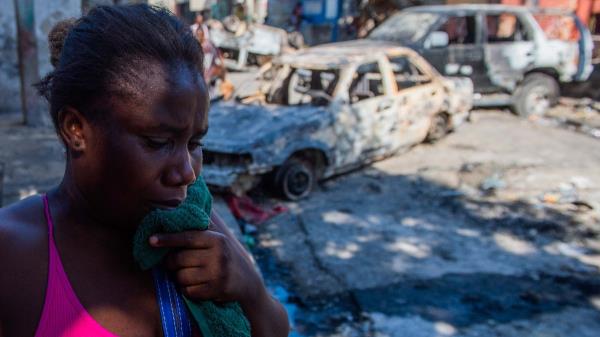 Ro<em></em>nalda Alcime cries after armed gangs executed her husband at Poste Marchands in Port-au-Prince, Haiti, Dec. 9, 2024. (AFP Photo)