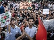 Members of the Bangladeshi Hindu community hold banners and chant slogans against violence targeting the country's minorities during a protest in Dhaka. (File image/AFP)