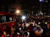 Mumbai: Security perso<em></em>nnel and other people gather at the site after a BEST undertaking's bus rammed into pedestrians as well as vehicles on a road at Kurla, in Mumbai (Photo: PTI)