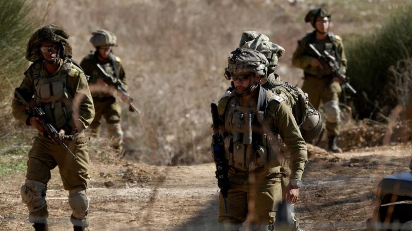 Israeli troops move on the Syrian side of the border near the Druze village of Majdal Shams, in the Israeli-annexed Golan Heights, Dec. 9, 2024. (EPA Photo)