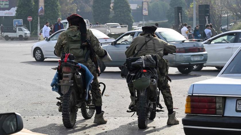 Anti-regime forces patrol a street in Damascus, Syria, Dec. 10, 2024. (AFP Photo)